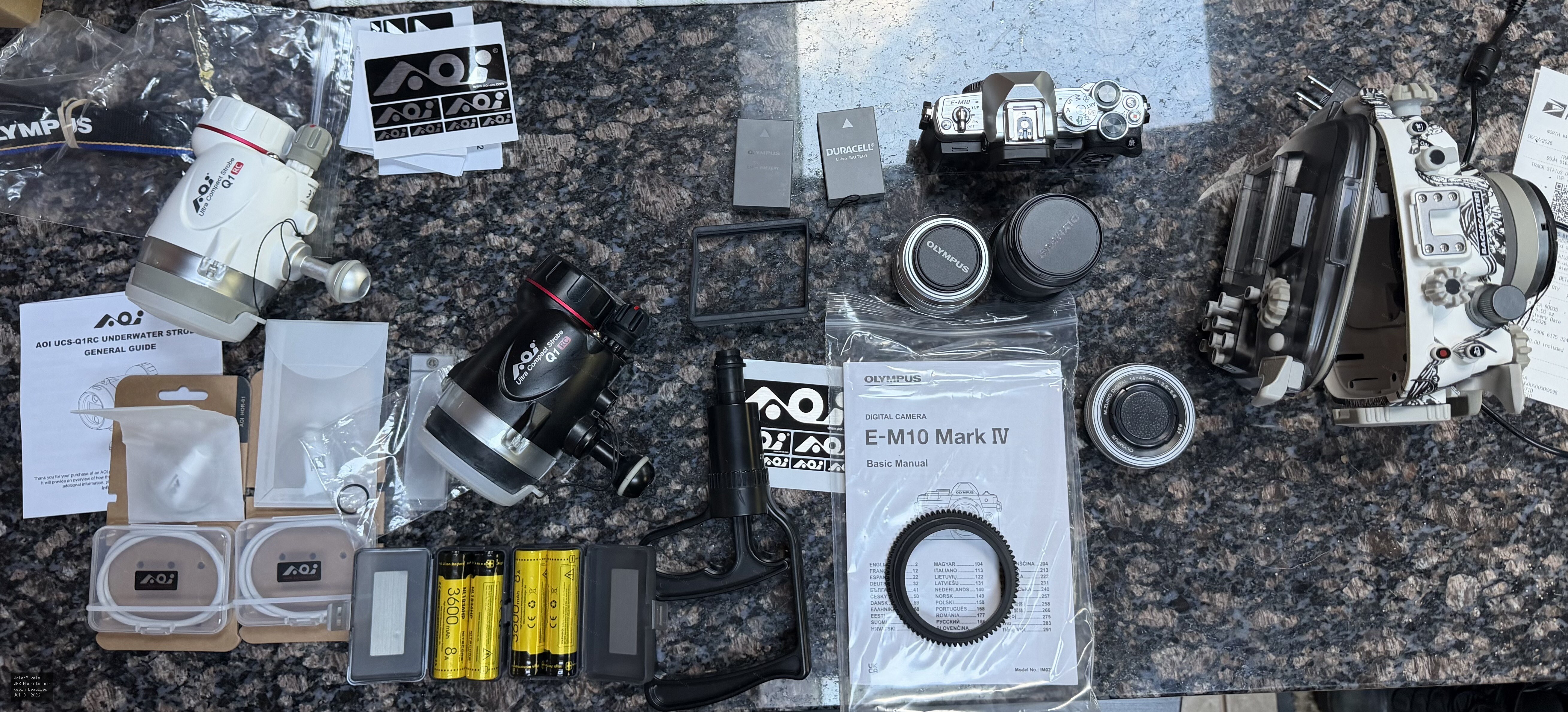 OM-D E-M10 Mk IV Camera, AOI housing, kit lens, 60mm macro lens, AOI Q1 RC strobe pair